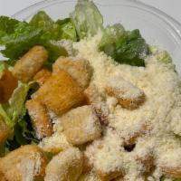 Caesar Salad · Romaine, Grated Parmesan Cheese, Croutons.
