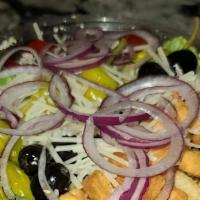 The Quaker Salad · Romaine, Tomato, Black Olives, Red Onion Pepperoncini, Croutons, Grated Parmesan Cheese.