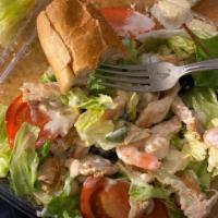 Tossed Salad With Grilled Chicken · House salad with your choice of dressing topped with grilled chicken. Add shrimp for an addi...