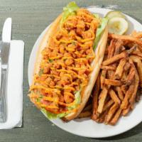 Seafood Po Boy · Your choice of shrimp, crawfish, or catfish topped with lettuce, tomato, and creole mustard.