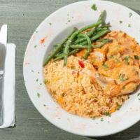 Chicken & Crab Etouffee · Served with asparagus over dirty rice.