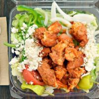 Buffalo Tender Chicken Salad · All salads are served with pita bread and your choice of dressing. Garden salad topped with ...