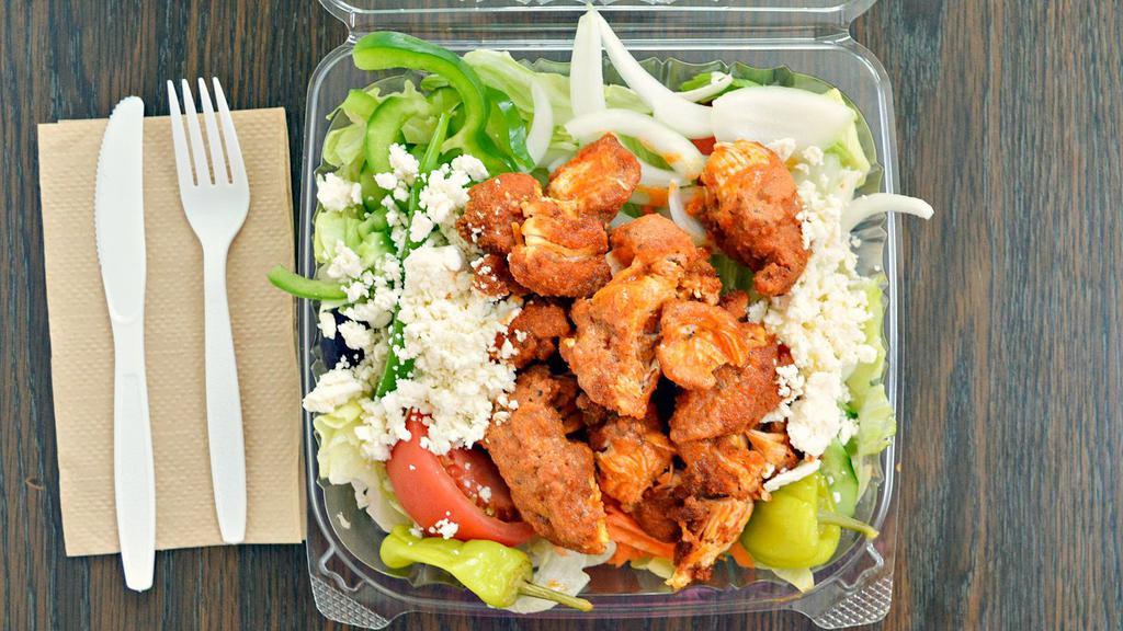 Buffalo Tender Chicken Salad · All salads are served with pita bread and your choice of dressing. Garden salad topped with buffalo tender chicken.