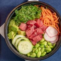 Spicy Tuna Pokebowl · Tuna, avocado, seaweed salad, radish, ginger carrots, edamame pods, cucumber, and sesame see...