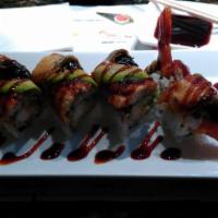 Dragon Roll · Shrimp tempura roll wrapped with eel and avocado