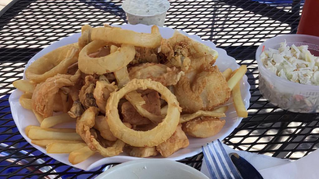 Seafood Santorini Plate · Shrimp, clams, haddock, scallops, fries, and onion rings.