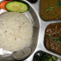 Daal Bhaat Tarkari (Lentil Rice) · Rice, mas ko daal (black lentils), rayo saag(green mustard), mula ko achar(radish pickle), g...