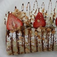 New York · Homemade cheesecake filling, fresh strawberries, strawberry topping, graham crackers, topped...