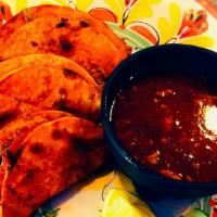 Birria Tacos · Birria Tacos with melted cheese. Served with Birria stew for dipping. Served with onions, ci...