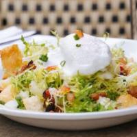 Warm Frisée Salad With Poached Egg · Roasted bacon, potato, croutons, and balsamic dressing.