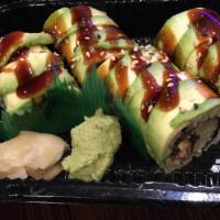 Dragon Roll · Eel cucumber roll. Topped with avocado, eel sauce, and, sesame seeds.