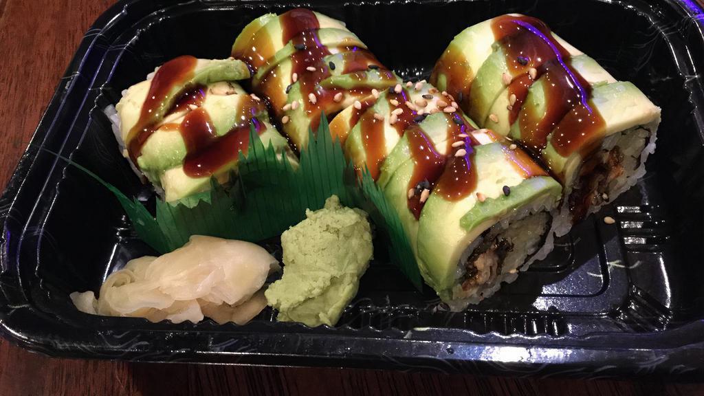 Dragon Roll · Eel cucumber roll. Topped with avocado, eel sauce, and, sesame seeds.