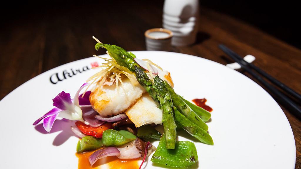 Chilean Sea Bass · Grilled seabass, onion, sitaki mushroom, snow peas, and asparagus. Served with miso sauce, miso soup, garden salad, and white rice or brown.