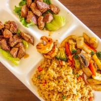 Hibachi Steak · Served with clear soup, garden salad, two shrimp appetizer, assorted vegetables, and fried r...