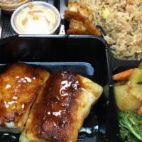 Hibachi Chilean Seabass · Served with clear soup, garden salad, two shrimp appetizer, assorted vegetables, and fried r...