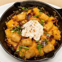 Loaded Tater Tots · smoky bacon, aged cheddar, green onions