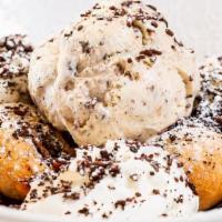 Fried Oreo Sundae · Cookies & Cream Ice Cream, Crushed Oreos, Chocolate Sauce