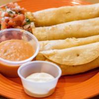 Flautas De Pollo · Four rolled crispy corn tortillas filled with chicken and cheese. Topped with lettuce, pico ...