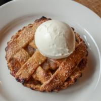 Apple Pie · Caramelized honeycrisp apples, almond cookie crust, vanilla ice cream