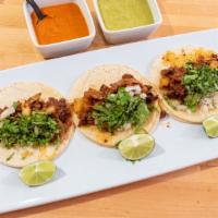 Birria Taco · Your choice of corn or flour tortilla. topped with onions and cilantro