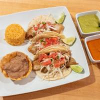 Shrimp Taco Platter · Three tacos,  topped with shredded cabbage and pico de gallo. Served with refried beans and ...