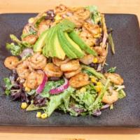 Taco Salad · Spring mix, whole black beans, red onion, sweet corn, avocado, tossed in chipotle dressing.