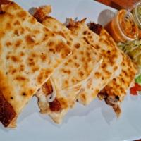 Grilled Chicken Quesadilla · lettuce, tomatoes and sour cream
