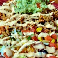 Al Pastor Burrito Bowl  · Served with,  lettuce,  pico de gallo, guacamole, rice, black beans and sweet corn. Finished...