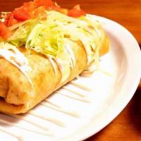Grill Chicken Chimichanga · flour tortillas loaded with refried beans, rice and cheese topped with lettuce tomatoes and ...