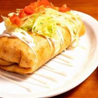Birria Chimichanga · flour tortillas loaded with refried beans, rice and cheese topped with lettuce tomatoes and ...