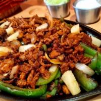 Al Pastor Fajitas · Sauteed red and green bell peppers, onions. Served with lettuce, tomatoes  and sour cream.  ...