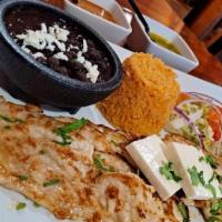Pollo A La Plancha · Grilled chicken, served with rice,  black beans  salad and corn tortillas