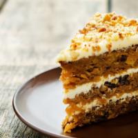 Carrot Cake · Moist cake spiced with cinnamon and frosted with a cream cheese frosting.