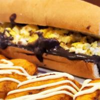 Pan Con Huevo Y Frijol · Toasted bread, scramble eggs, black beans & side of fried plantain.