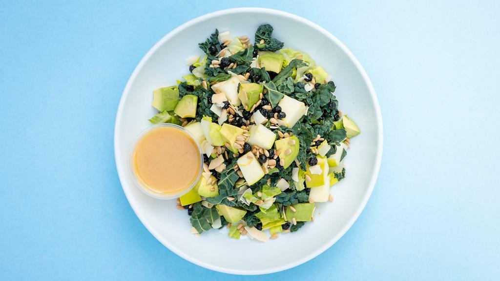 Easton St. · Kale, romaine lettuce, avocado, green apples, dried blueberries, radish sprouts, dried coconut, and sunflower seeds tossed with ginger miso vinaigrette