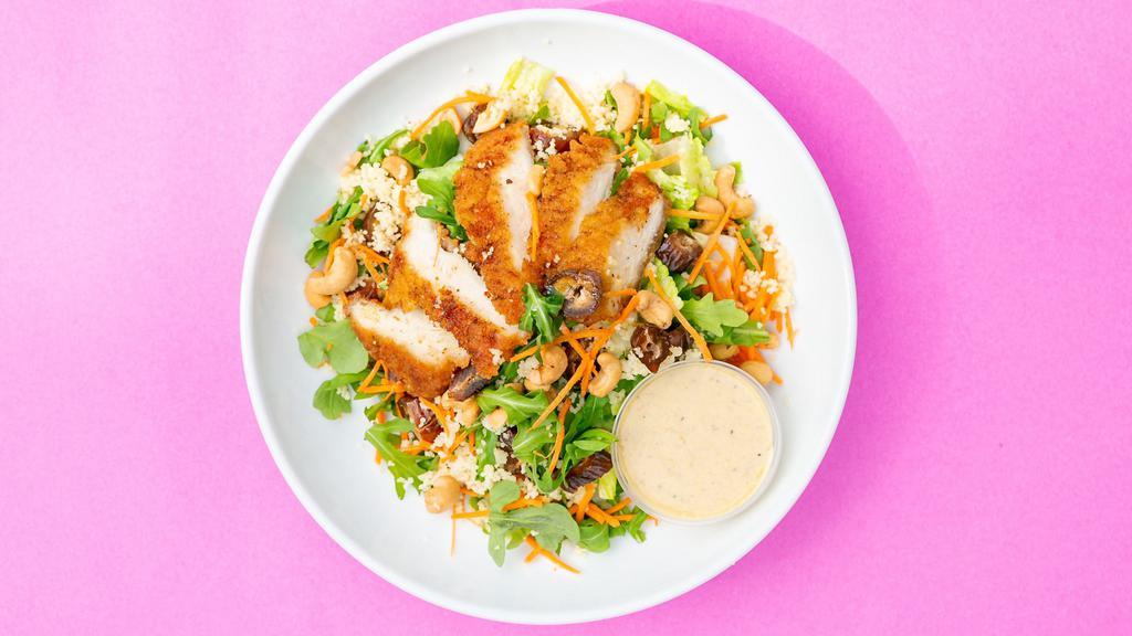 Thirty Acres · Romaine lettuce, arugula, fried chicken, couscous, shredded carrots, medjool dates, and cashews with honey spiced yogurt dressing