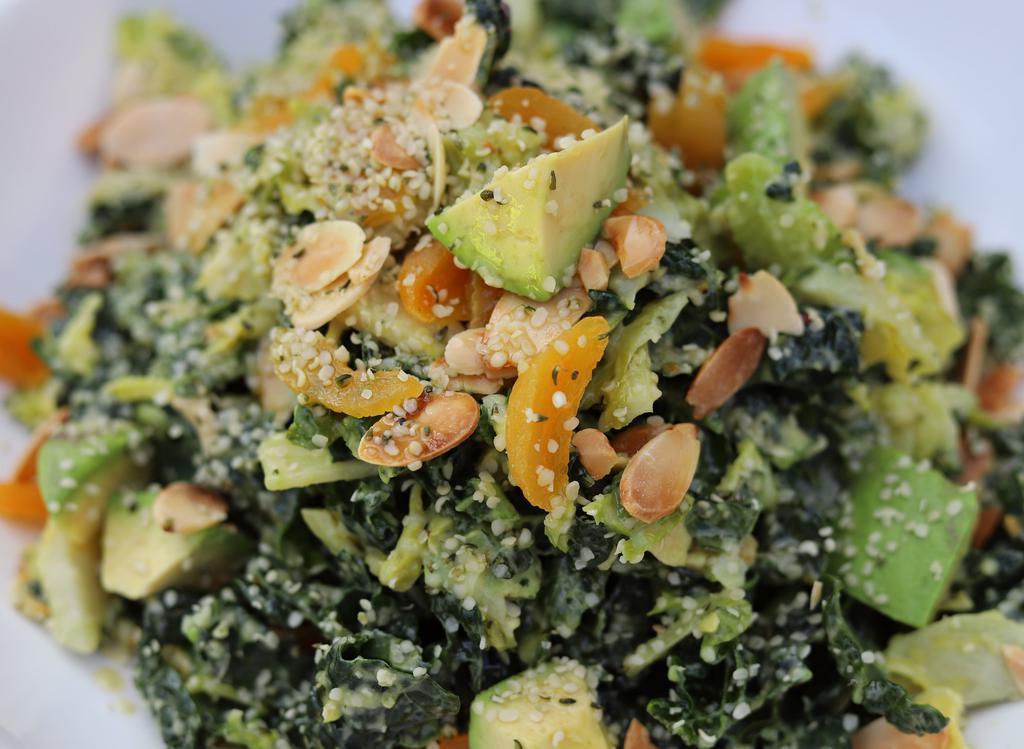 Polpis · Kale, shaved brussels sprouts, hemp seeds, toasted almonds, dried apricots, and avocado tossed with apricot vinaigrette
