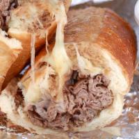 Monomoy · Roast beef and provolone on a toasted Italian sesame sub roll comes with side of au jus dip ...
