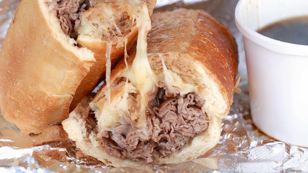 Monomoy · Roast beef and provolone on a toasted Italian sesame sub roll comes with side of au jus dip (oven toasted)