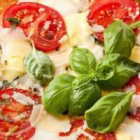 Margherita · Fresh tomatoes, basil garlic & fresh mozzarella cheese.