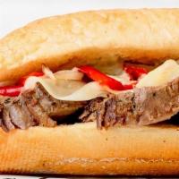Cheesesteak · steak, provolone cheese, roasted red pepper + shallots, herb aioli on baguette