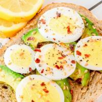 Avo Toast · avocado, cage-free hard boiled egg, chia/flax seeds, red pepper flakes, lemon squeeze on mul...
