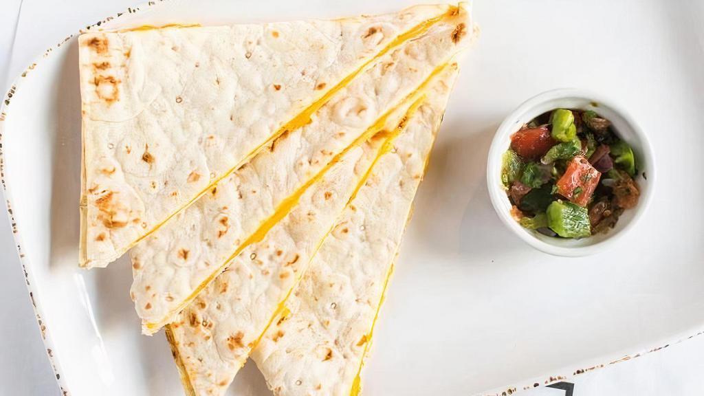 Quesadilla · flour tortilla with melted cheddar cheese with a side of pico-de-gallo