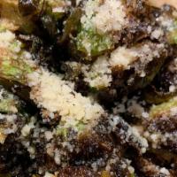 Crispy Brussels Sprouts · Gluten-free. Vegan parmesan and agave barbecue glaze.
