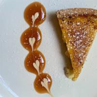 Cremé Brulée Cake · Rich Custard on top of a butter tart shell with a brittle top crust of caramelized sugar.
