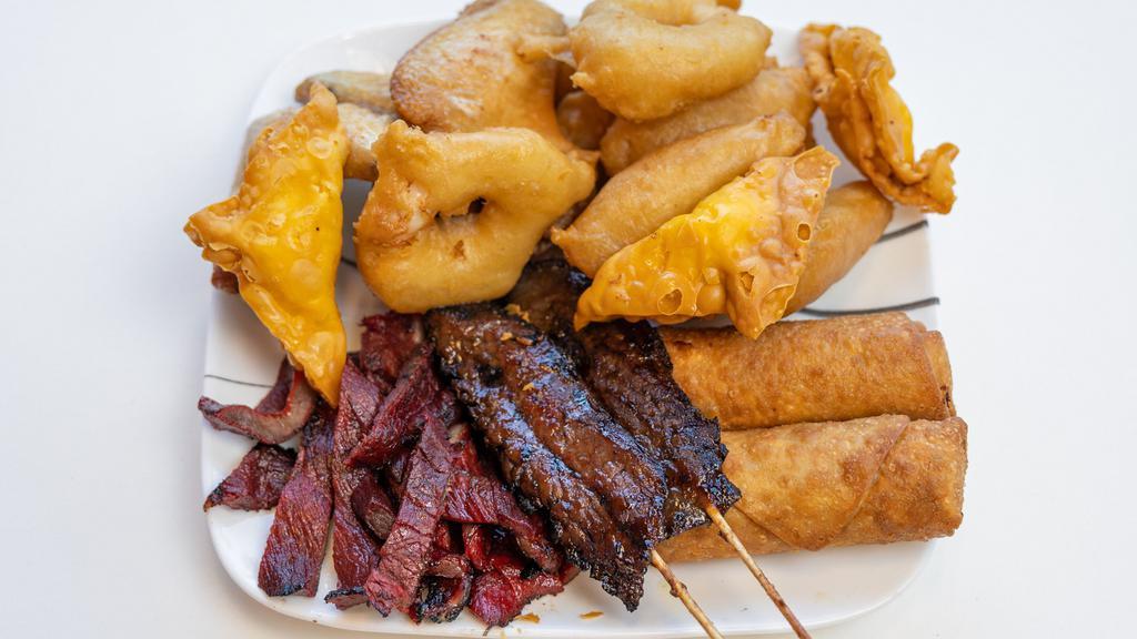 Pu Pu Platter · Egg rolls, chicken wings, chicken fingers, boneless spare ribs, fried jumbo shrimps, beef teriyaki, crab rangoon