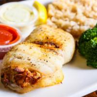 Flounder Stuffed With Crab Meat · 8 oz flounder stuffed with crab meat fried or broiled.  Served with choice of 2 sides.