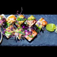 Nara-Ya Roll · Spicy salmon, asparagus, . topped with salmon,. avocado, black pepper, . torched with a lemo...