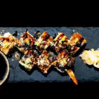 Electric Eel Roll · Shrimp tempura, cucumber,. lemon mascarpone, topped with fresh water eel, avocado kosho, tem...