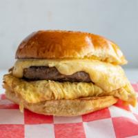 Sausage Egg And Cheese Sandwich · All grass fed beef sausage patty, scrambled free-range egg, Wallaby and Vermeer cheese sauce...